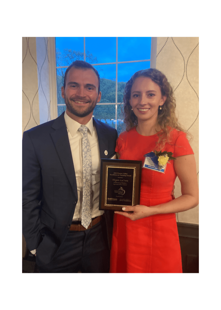 Megan and her husband, receiving an award for Excellence in Teaching in the Pioneer Valley